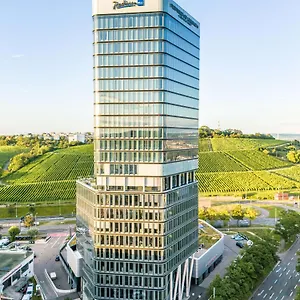 Отель Radisson Blu At Porsche Design Tower